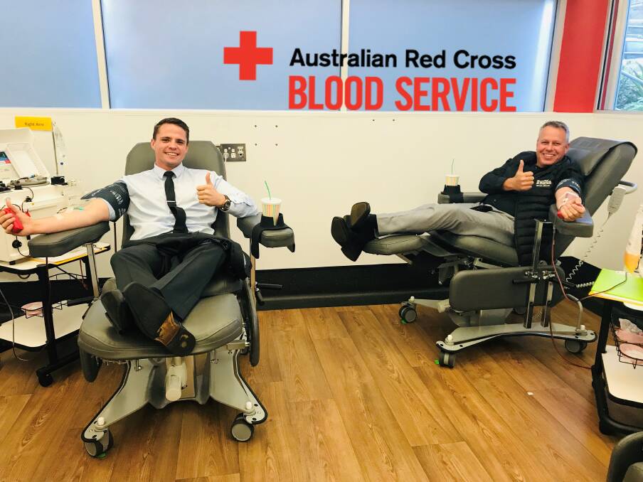 Acts of kindness: Andrew Stokes and Stewart O'Brien are two of the staff who regularly donate plasma at the Port Macquarie Red Cross Blood Service.