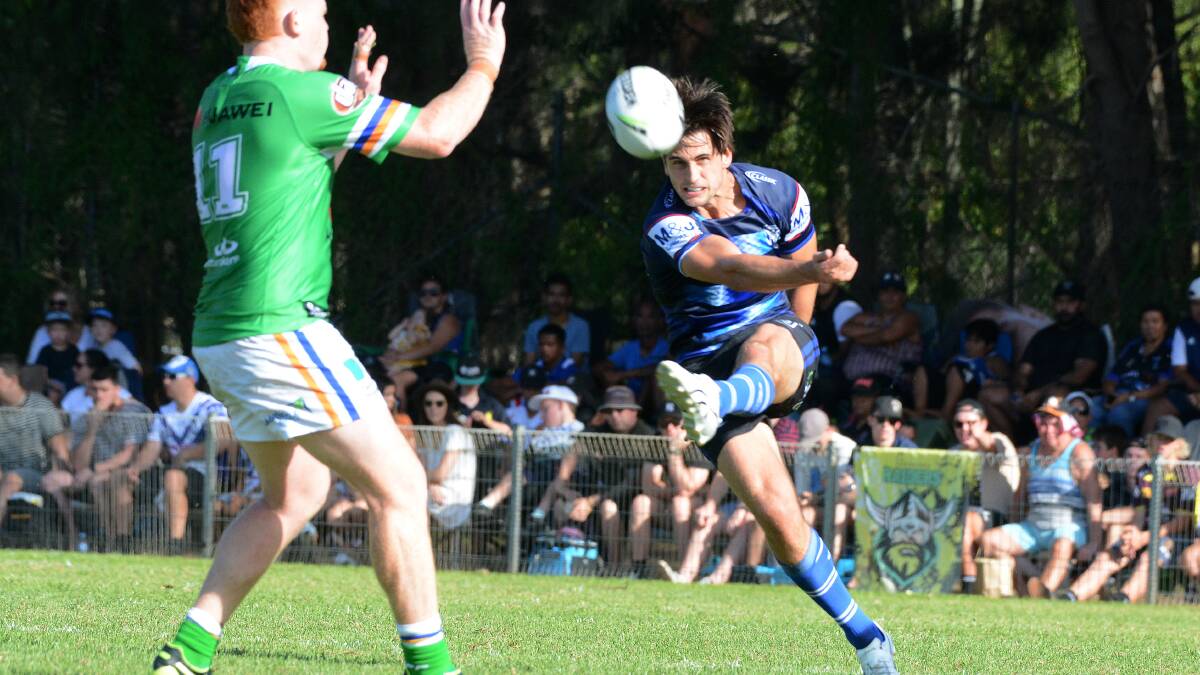 Boot to ball: Lachlan Lewis kicks downfield during Canberra's 12-10 win over Canterbury in Port Macquarie on Saturday. Photo: Scott Calvin