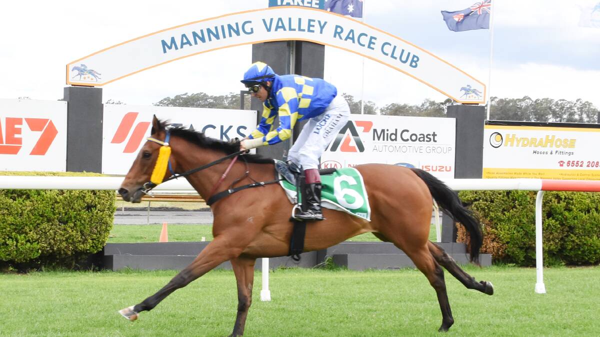 Peter Graham scores on Time Stalker for trainer Dean Jackson in the Iron Jack Benchmark 50 Handicap, the first of his winning double at Taree on Tuesday.