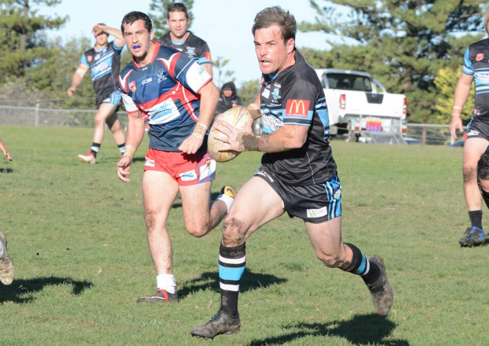 Port Macquarie halfback Joe Cudmore was assisted from the field during the minor semi-final against Wingham.
