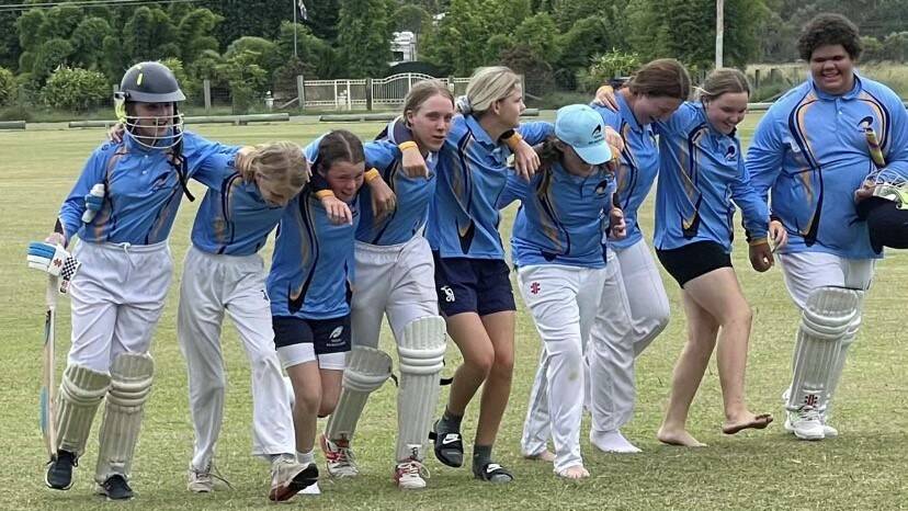 Mid North Coast players celebrate after a win against North Coast in the championship played at Grafton.
