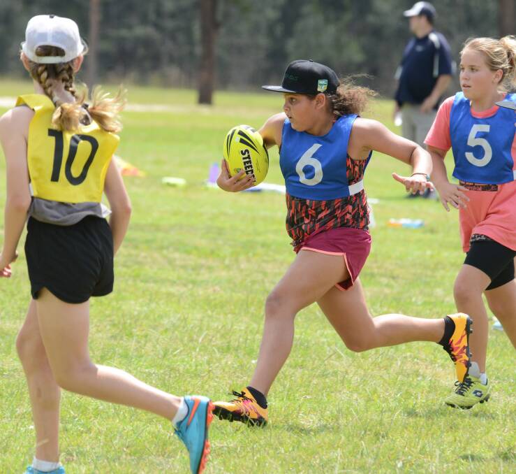 Nyokah Dumas makes a charge during selection trials for the Taree Junior State Cup teams played last month.  
