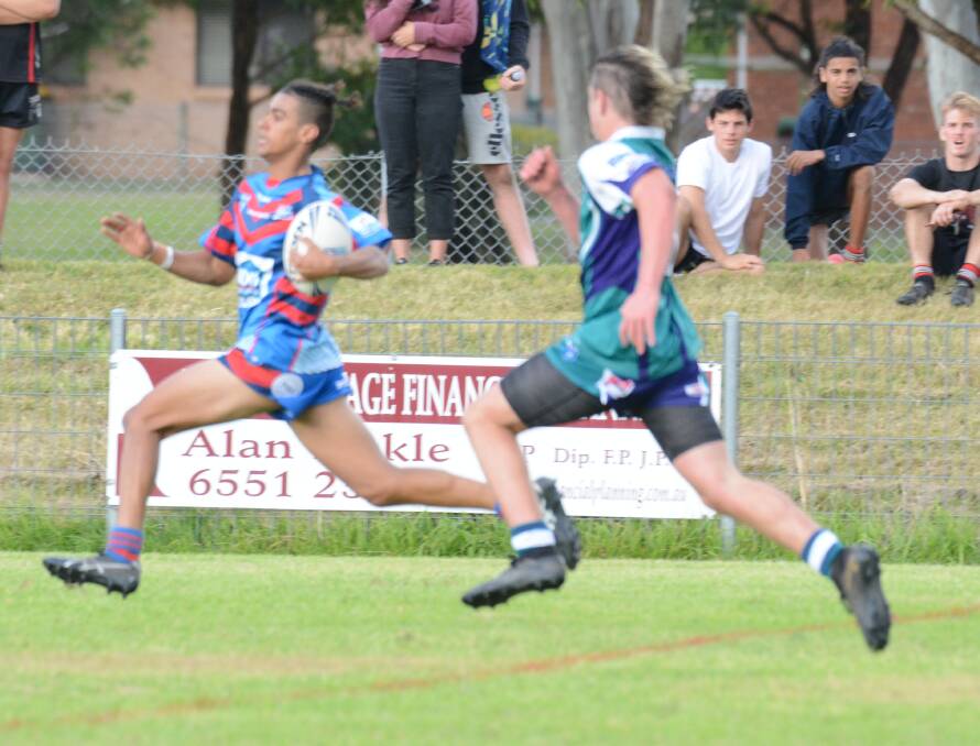 Wauchope's Cooper Moreta races away to score for Wauchope in the under 18 clash against Taree City. Wauchoe won 38-10.
