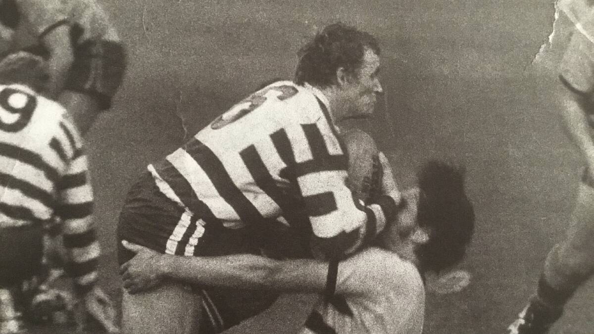 Hard yards: Phil Amidy in action.