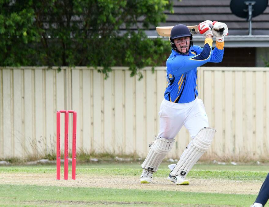 Opener Austin Murray batting in the opening game of the Stan Austin Carnival. His unbeaten 41 steered Mid North Coast to a win over Newcastle in the playoff for third place. 