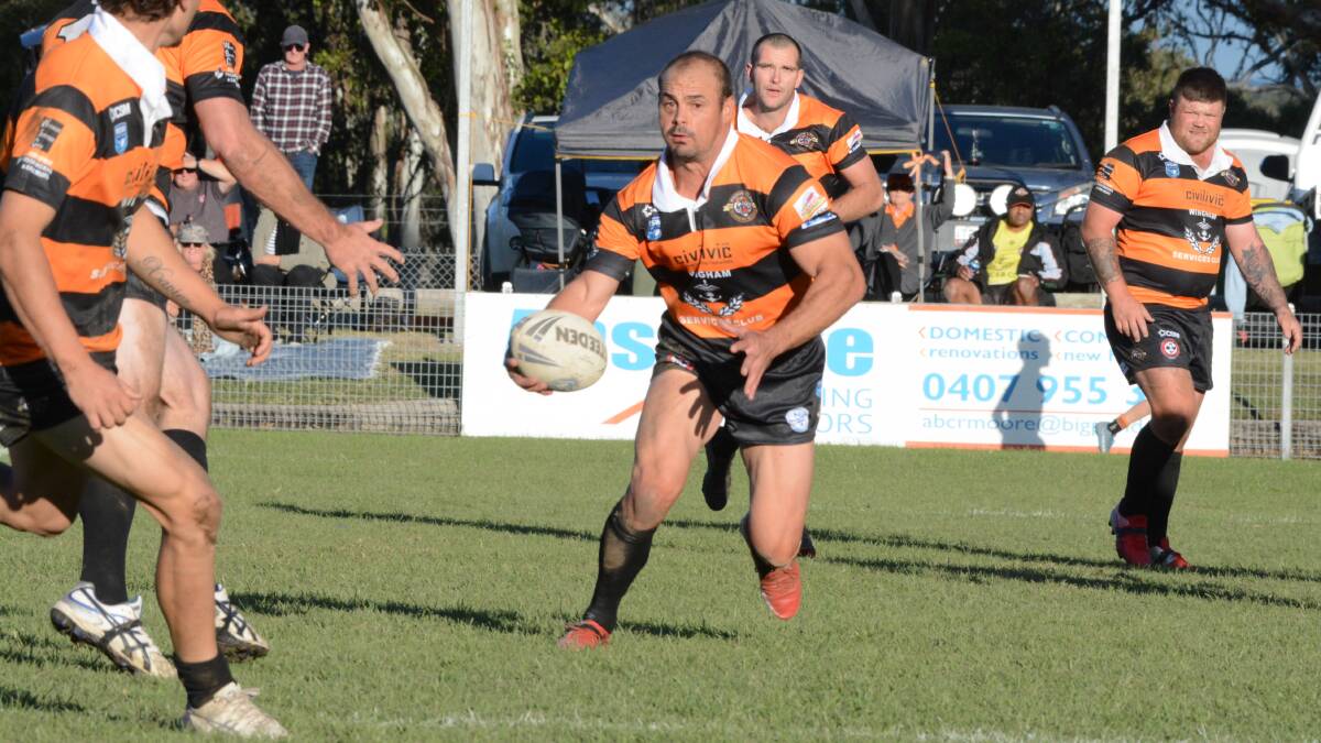 Wingham captain-coach Mick Sullivan works a move in the clash against Taree City. Sullivan was outstanding in the 46-22 win.