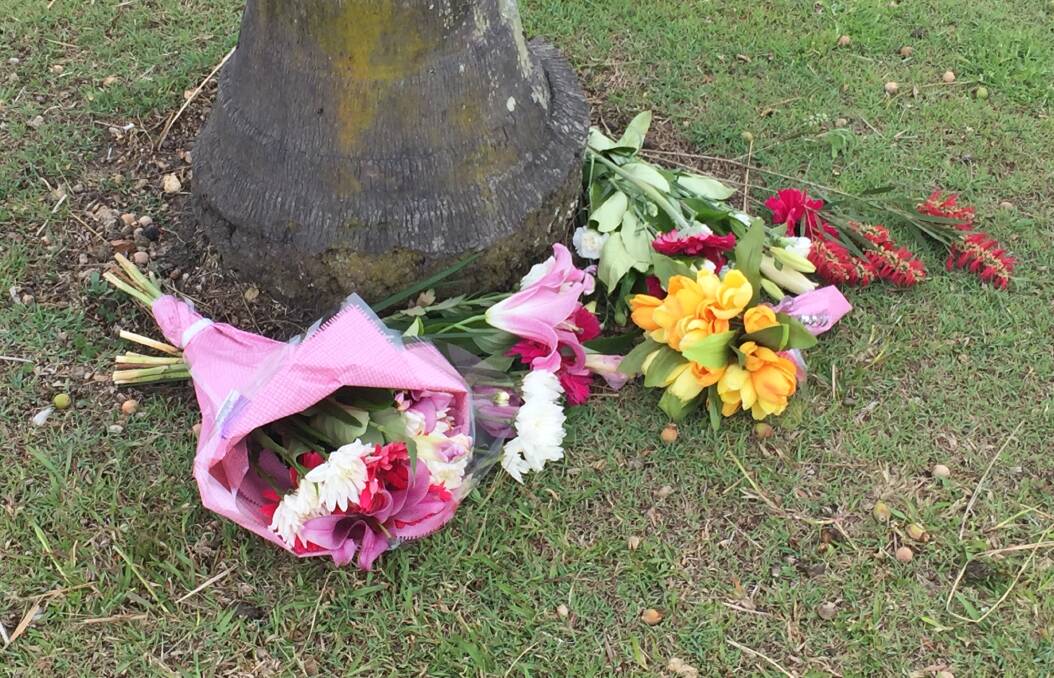 A floral tribute at the Nambuzza Plaza shopping centre.