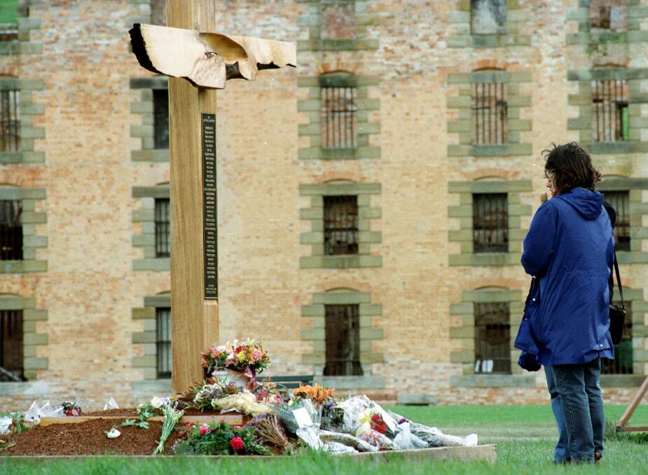 MEMORIAL: Visitors stop at the memorial dedicated to victims of the Port Arthur massacre.