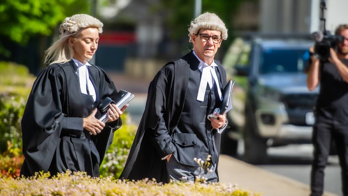 Prosecutors Skye Jerome and Shane Drumgold SC leave their office on Wednesday. Picture by Karleen Minney