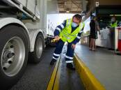 Compliance officer Tim Chesterton inspects truck at Marulan Heavy Vehicle Safety Station. Picture: Elesa Kurtz