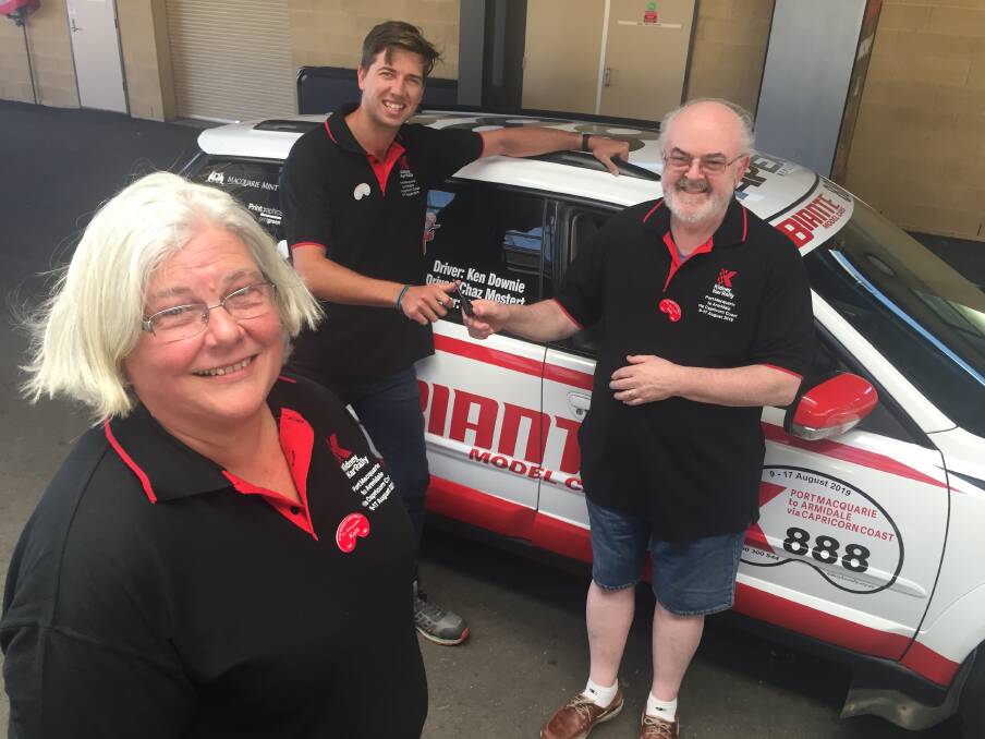 Ready to go: V8 Supercars driver Chaz Mostert taking the keys to the Biante Model Cars Subaru from event sponsors and participants Ken and Kath Dowmie.