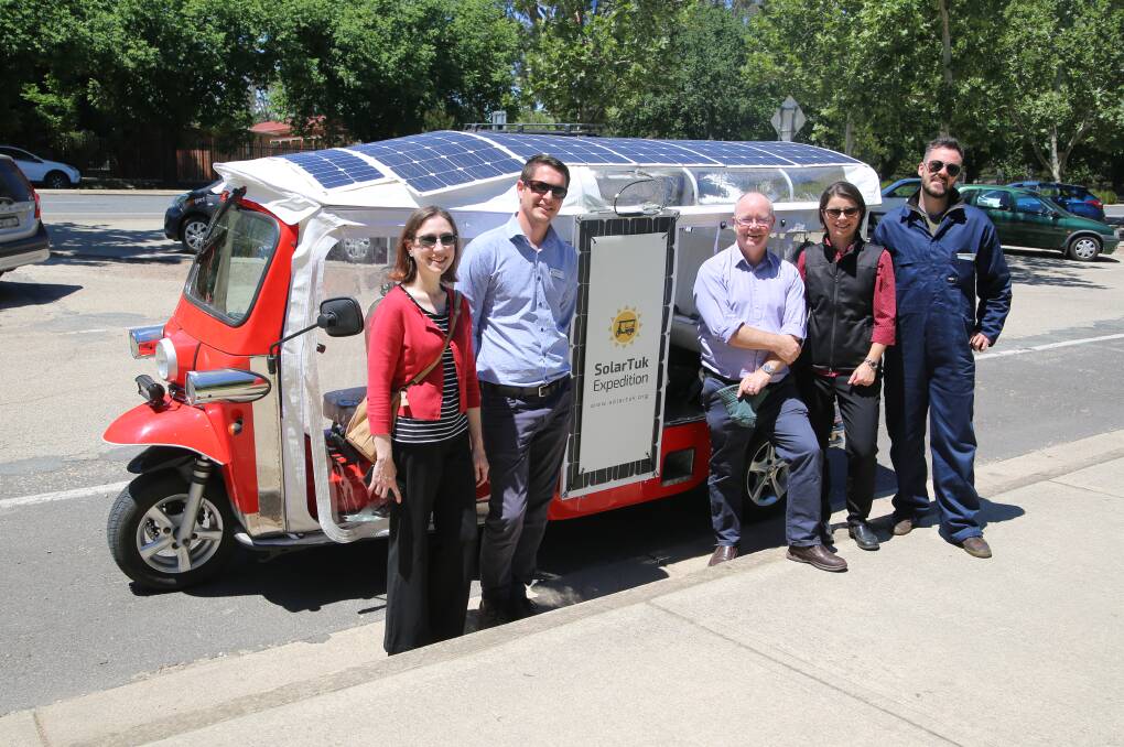 Some of the solar-powered tuk tuk team.
