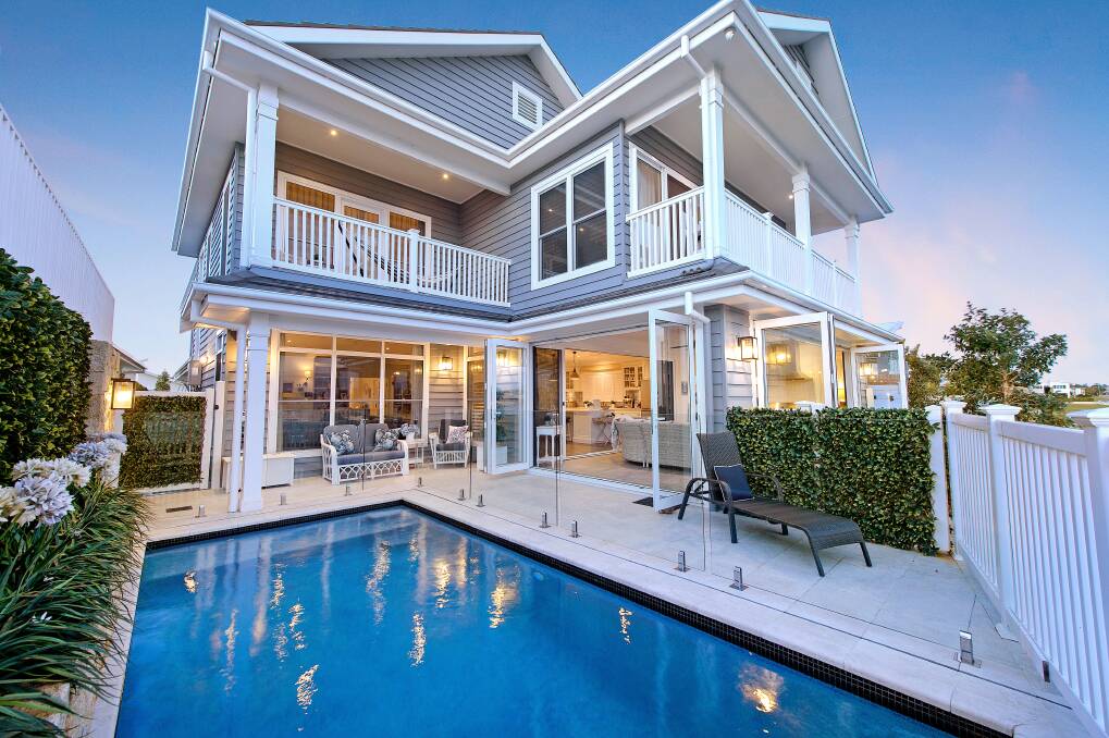 Record price: Elders Real Estate Port Macquarie set a new residential house price record of $2.95m for this canal property at 74 The Anchorage. Photo: Elders Real Estate