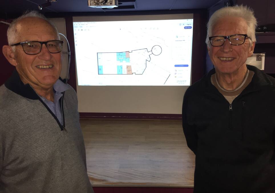 Star gazing: Port Macquarie Astronomical Association member Chris Ireland and president David Edgerley with the upgraded plans for the popular science centre and observatory.