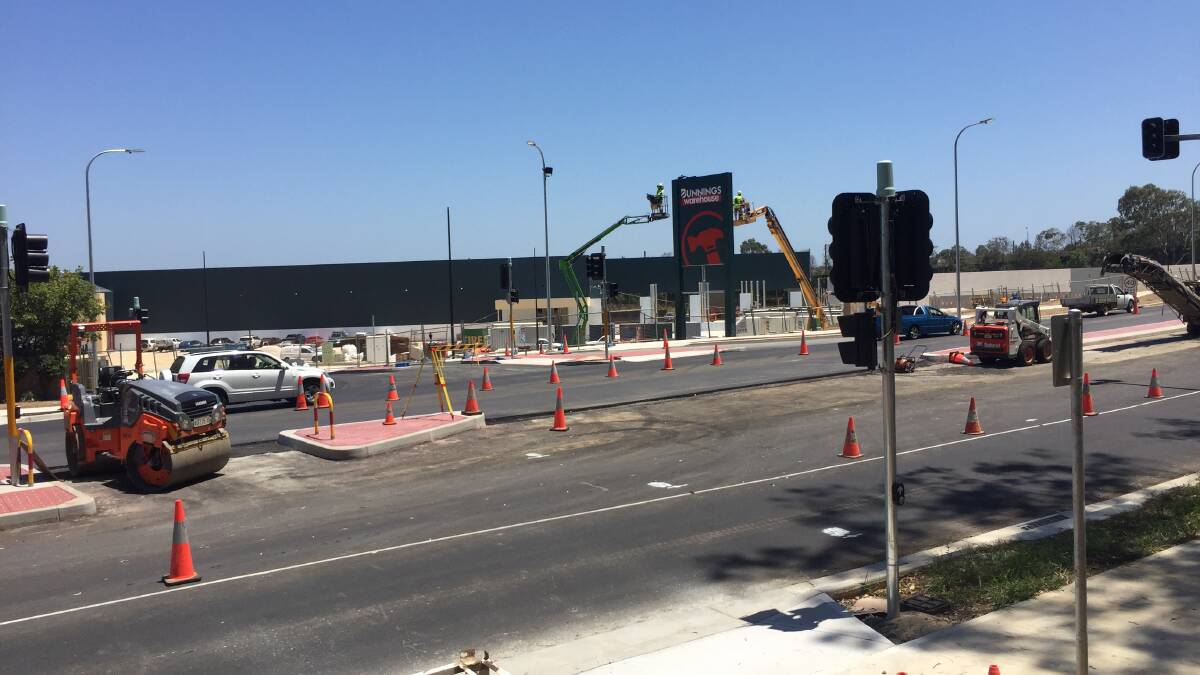 Works continue: The new mega-Bunnings store on John Oxley Drive should be opening in early March.