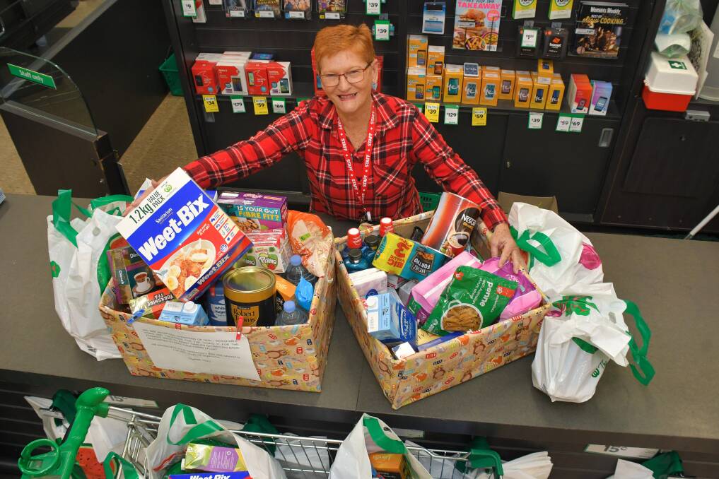 Helping hands: Port Macquarie's Sherrill Weidenbohm with some of the items donated for our drought-affected farmers. Photo: Ivan Sajko