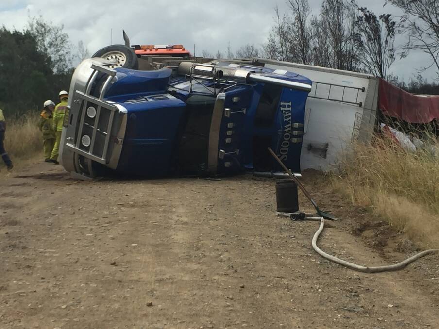 Over and out: A truck rollover on Maria River Road has highlighted the poor condition of the unsealed link road. Photo: Peter Daniels