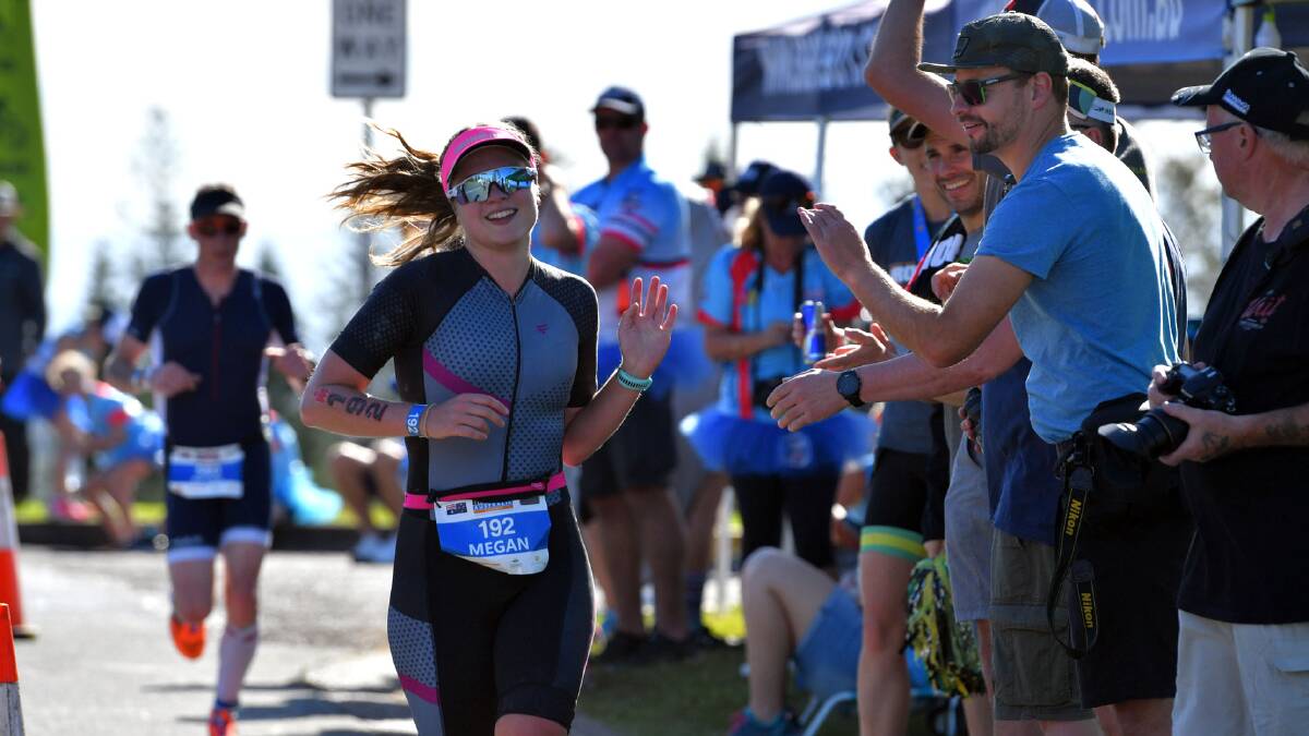 Get onboard: Women are being encouraged to join the Ironman and triathlon ranks.
