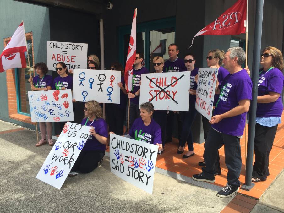 Walk-out: Family and Community Services staff walked off the job on Wednesday to protest a state government decision to continue the roll out of a new child protection system. Photo: Peter Daniels