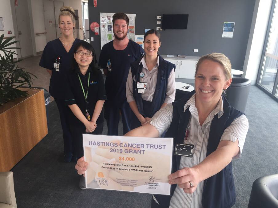 Great space: Port Macquarie Base Hospital nurse unit manager Emily Saul celebrating the Hastings Cancer Trust grant with staff Selina Chin, Peggy Meehan, Daniel Morrison and Hannah Williams.