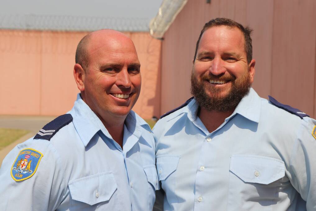 Rebuilding: Corrective Services NSW twins Adam and Luke Moffitt are working with inmates at the Kempsey Correctional Facility to rebuilding destroyed koala habitat.