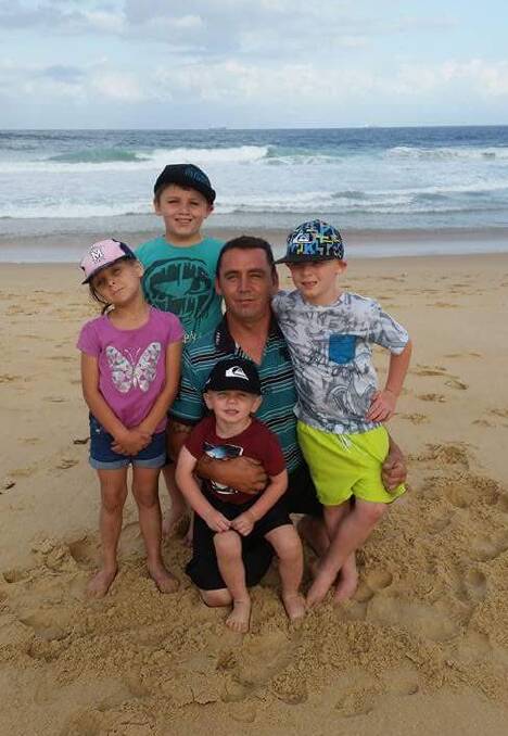 Family: Mark Keans and his four children.