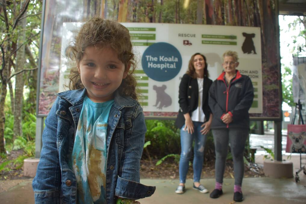 Thank you: Olivia Johnston, 4, with mum Danielle and Port Macquarie Koala Hospital life member and volunteer Margaret Hearle.