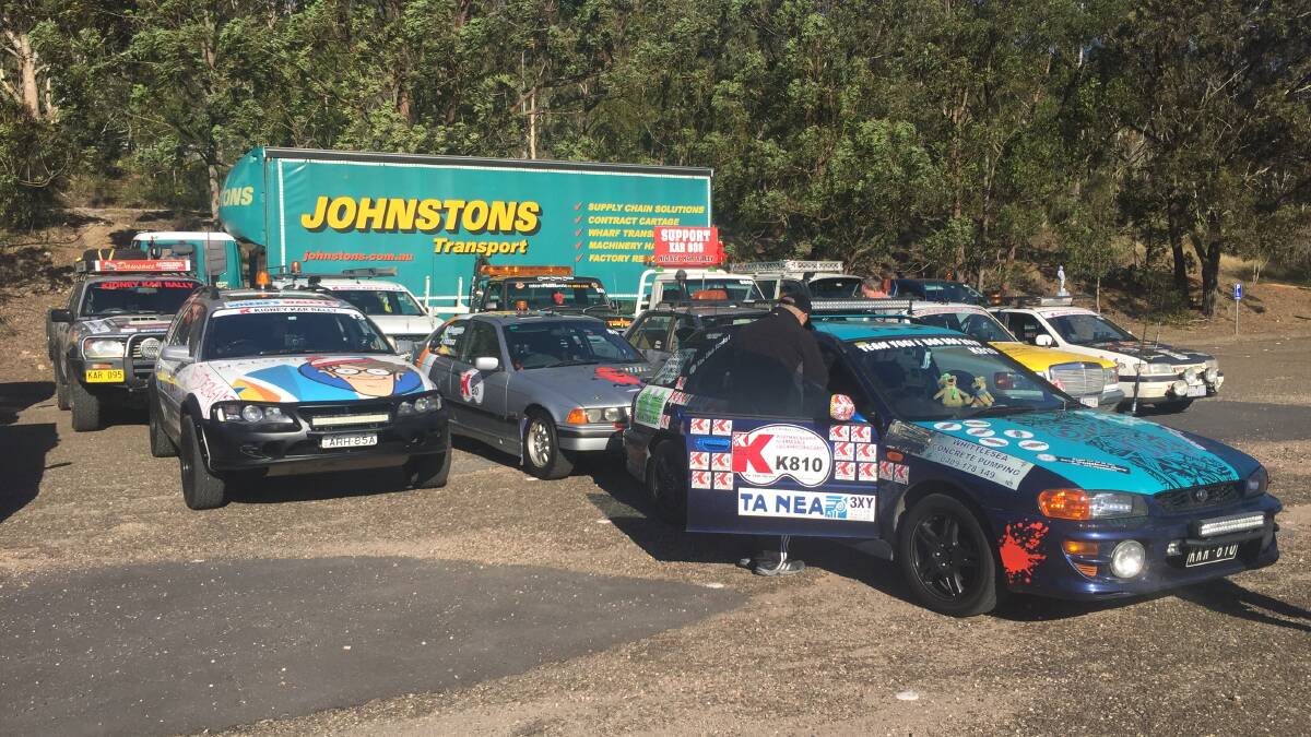 Ready to go: Some of the cars that left Port Macquarie Racecourse on Saturday morning in the Kidney Kar Rally.