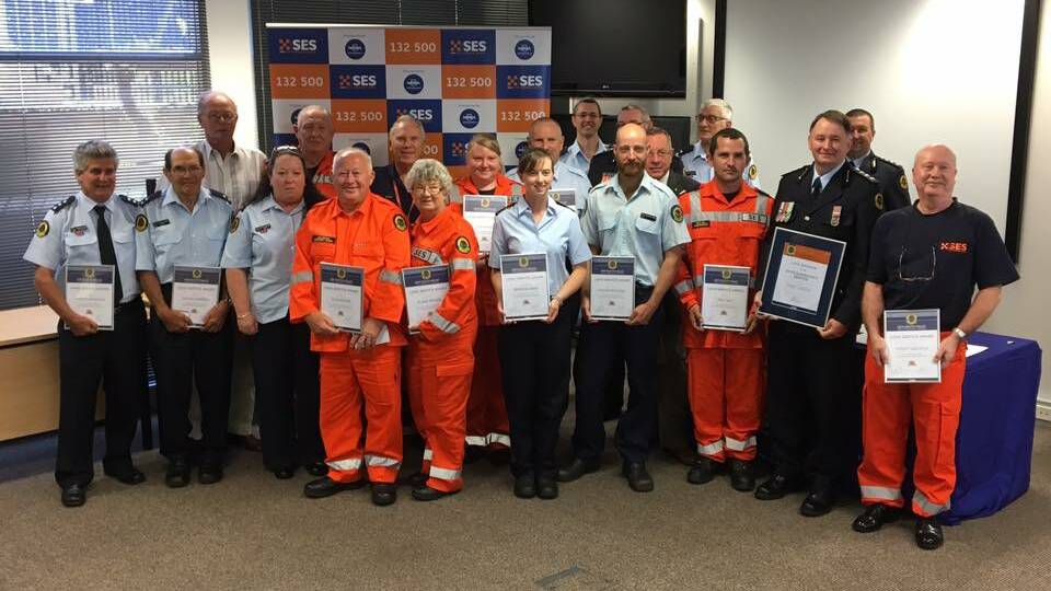 Well done: SES has recognised some of its longest serving members with an official presentation to 48 award recipients with 1060 years of volunteering to their local communities.