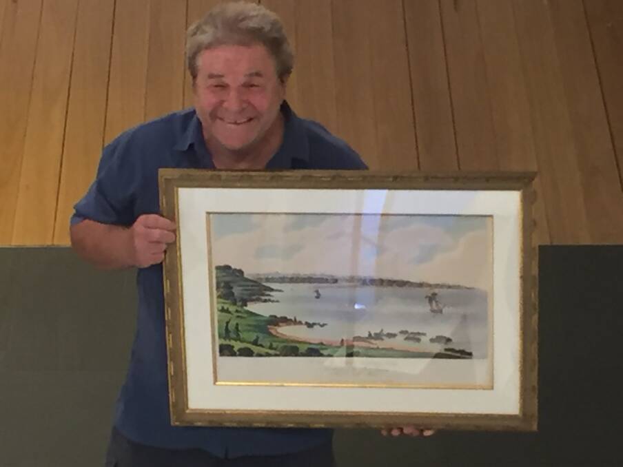 Historical exhibition: David Martin holding an aquatint etching created by Joseph Lycett in England in 1823/1824.