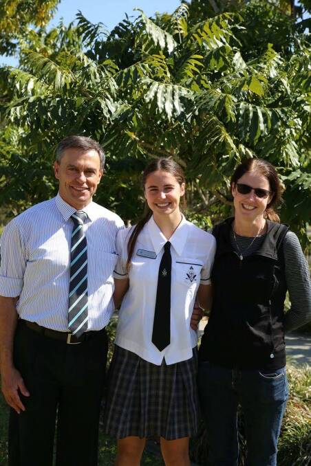 Proud family: St Josephs Regional College school captain Elizbeth Pike with her parents Jack and Rosie Pike. Photo: supplied