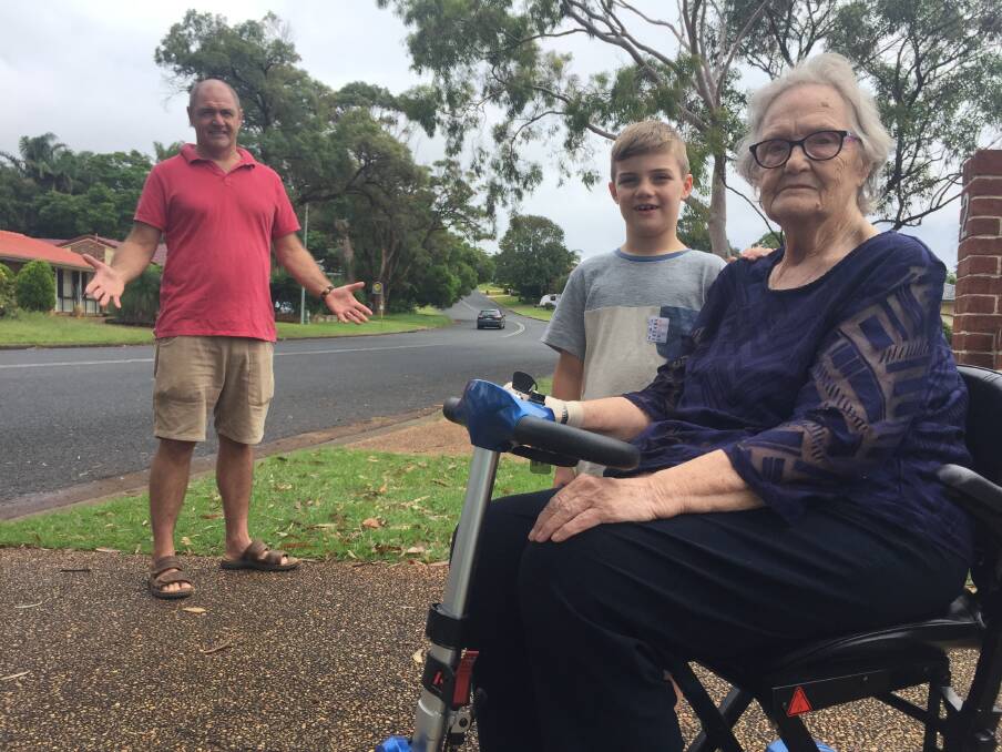 Isolated: Port Macquarie's Pat Tucker says she feels isolated after learning she can no longer drive her mobility scooter onto a maxi taxi. Her son Jeremy and eight-year-old grandson Joe share her concerns.