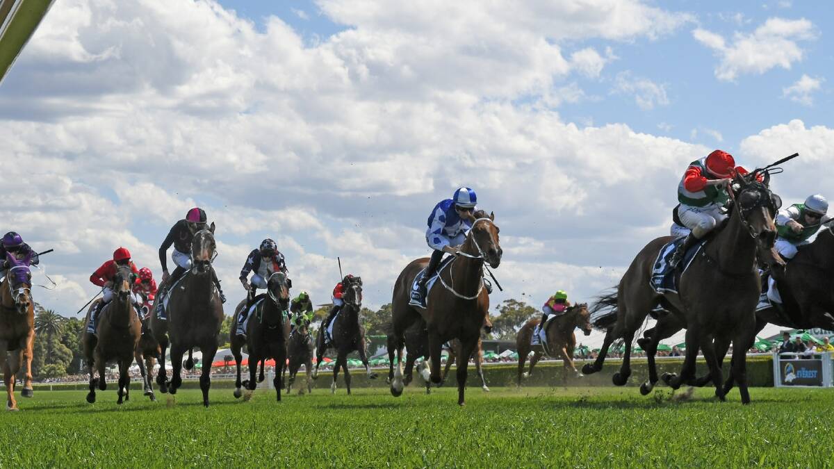 Handle The Truth wins the $1.3m Kosciuszko from a fast-finishing Victorem. Photo: Racing NSW