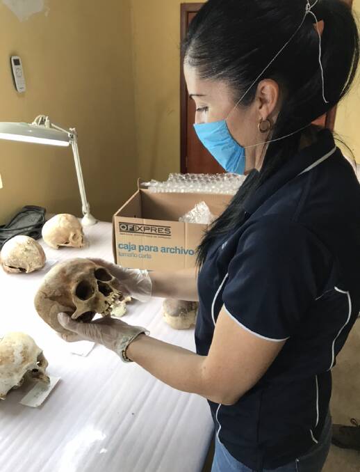 Cutting edge: Alyson Wilson analysing skeletal remains in Mexico. She is currently part of a world-first Australian research into post-mortem movements.