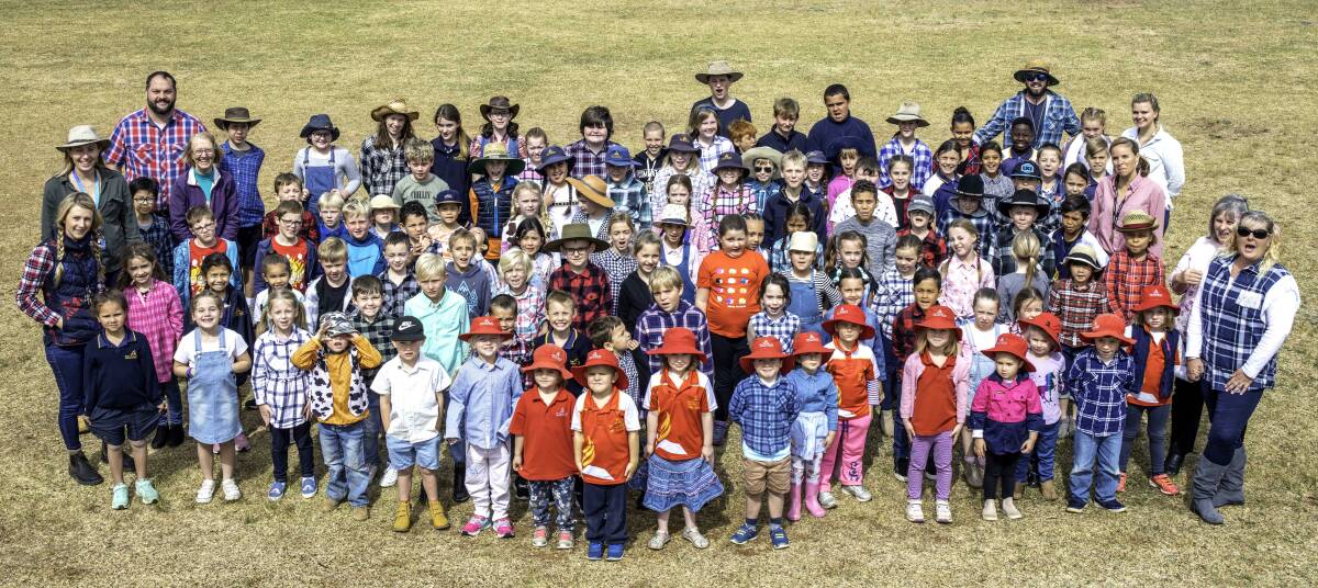 Support: Teachers and students of Port Macquarie Adventist School showing their support for drought-affected farmers on Friday August 31. Photo: supplied