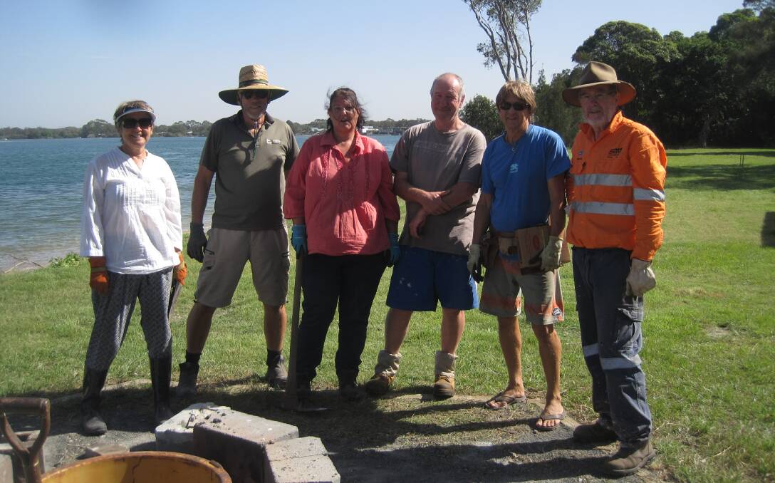 Celebration: Jo Taylor, Rob Johnston, Carla McKern, Dave Gumbleton, Kingsley Searle and Bryan Galbraith helping clean up North Shore's Coal Wharf for Sunday's Heritage Week celebrations. Photo: supplied