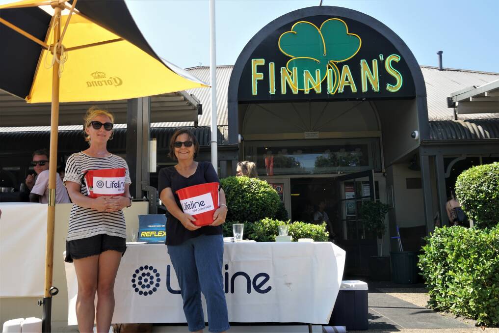 Fundraising: Kayla McMurtie and Lesley Kedward fundraising for Lifeline Mid Coast during the Triple J Hottest 100 at Finnian's Irish Tavern.