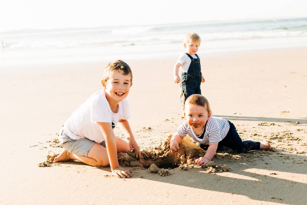 Family fun: Xavier, William and Leonardo enjoying the sunshine. Photo: Ivan Sajko