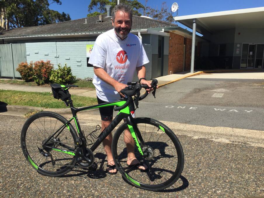 On your bike: Mark Jobbins stopped off in Port Macquarie to raise awareness about dementia. 