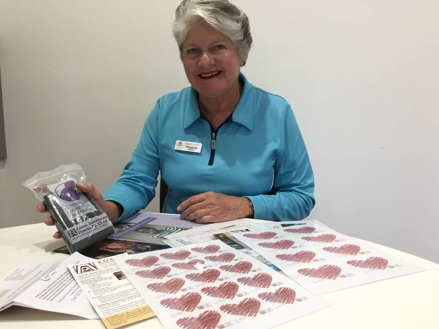 Fundraising effort: Zonta Club of Port Macquarie president Margaret Bateman holding one of the birthing kits. Club members will man a stand inside Port Central raising funds on Friday May 5.