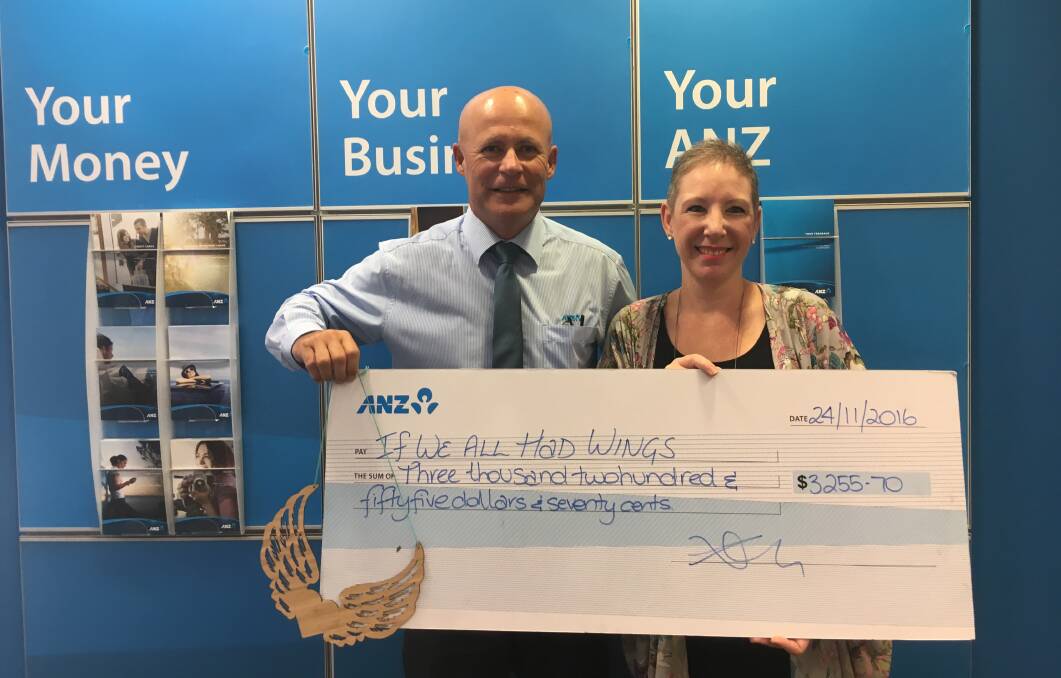 Taking off: ANZ Relationahip manager Peter Ebert with If We All Had Wings' Skye Petho.