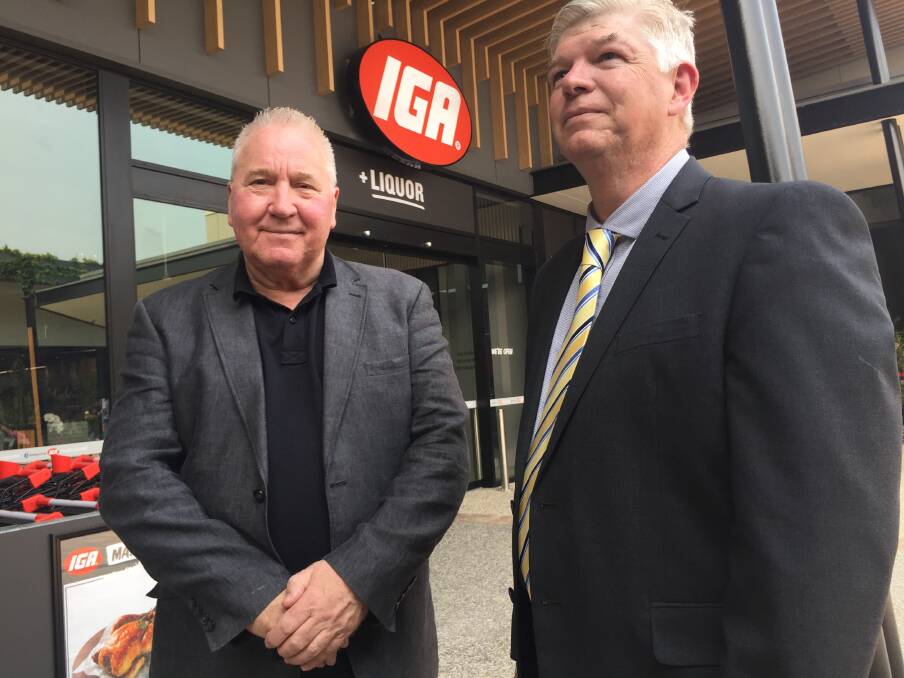 A leader: Supermarket Design Australia's Peter Harvey and Hastings Co-operative Ltd's Alan Gordon at the newly opened IGA supermarket at Sovereign Place Town Centre.