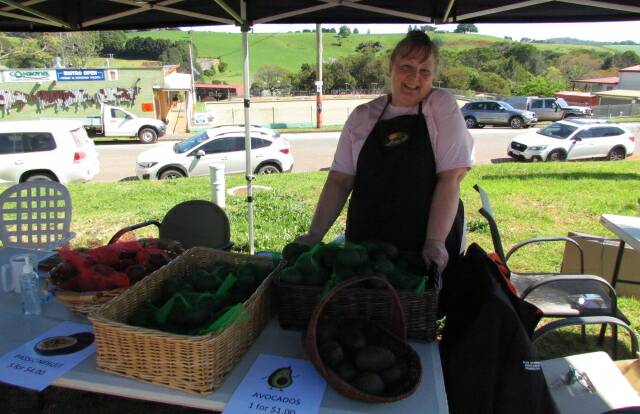 Museum fundraiser: Susan Fisher manning the avocado and fruit stall.