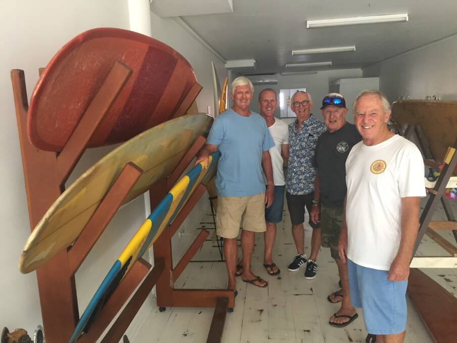 Surfing legends: Peter Hudson, Keith McMullen, Steve O'Connor, Ken Williams and Alan Jeffrey inside the Port Macquarie Surfing History Association's information pop-up centre on Horton Street.