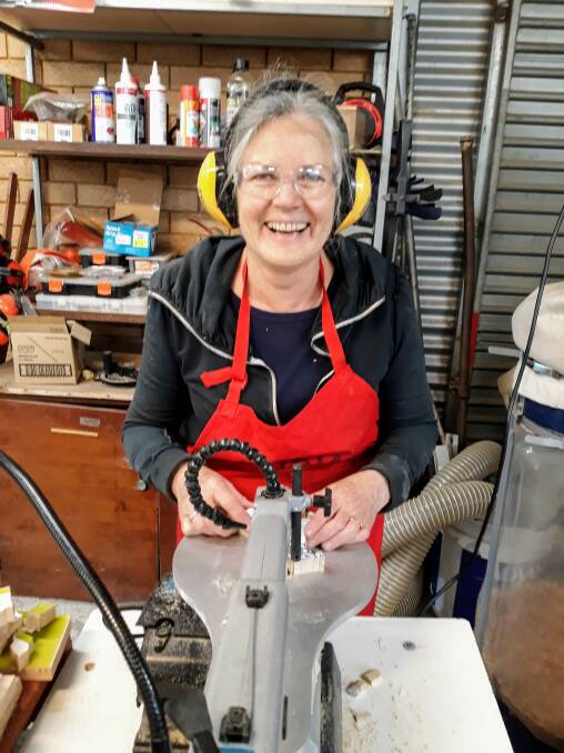 Top photo: Port Macquarie Women's Shed's Jennifer Tighe has won a major award with this photograph of member Ann Jenkinson.