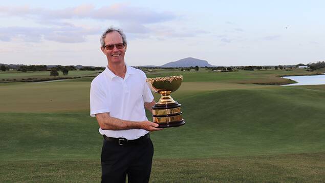 Winning feeling: David Bagust with the championship trophy today: Image: Golf Australia