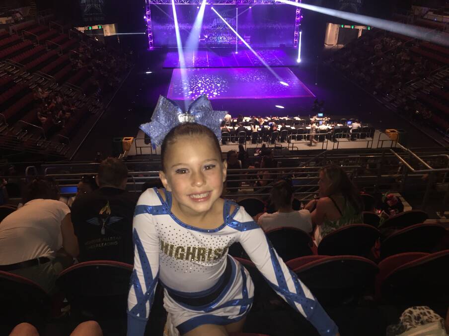 Star struck: Eight year old Scout Hodgson soaking up the atmosphere at the Cheerleading nationals. Photo: supplied