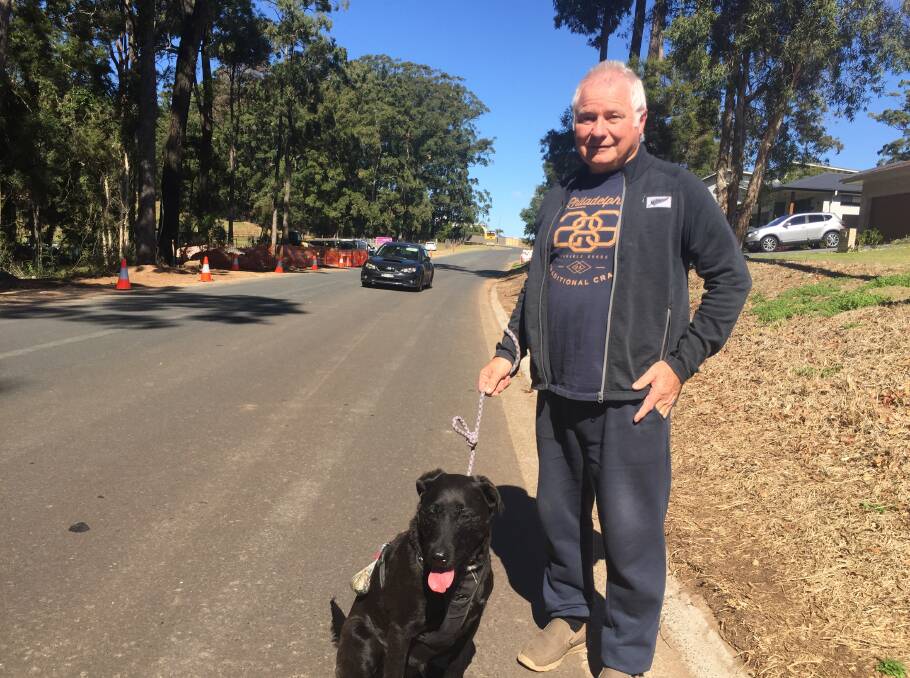 Walking the dog: Cottage Way's Garry Lonergan says the planned footpath upgrade and road widening should relieve some of their concerns.