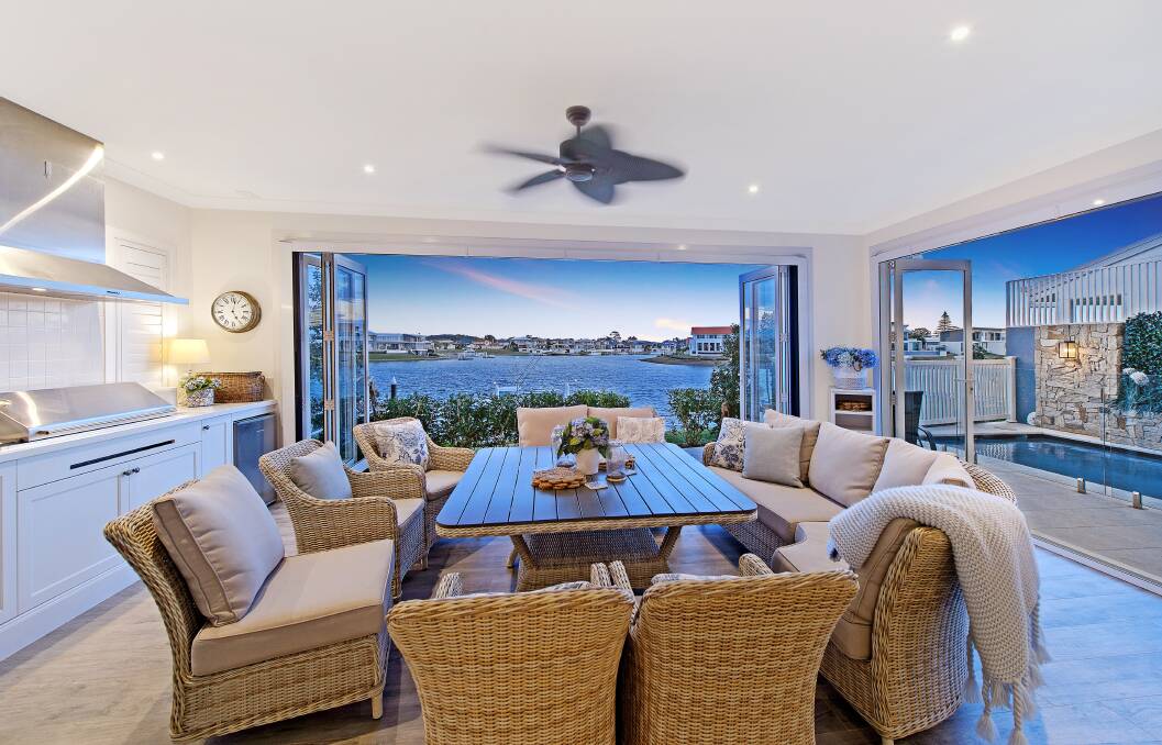 The property features extensive canal views. Photo: Elders Real Estate