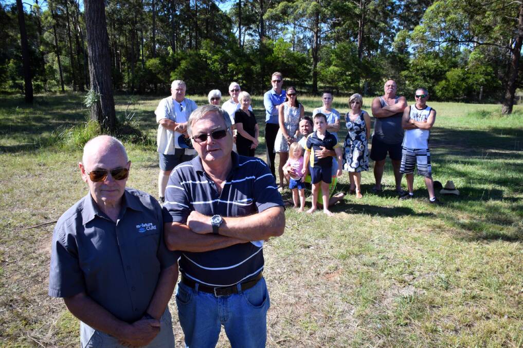 Not on our street: Bob Knuckey and Chris Stone are leading the opposition to plans to build six villas on a block of land in Blue Wren Close. Photo: Ivan Sajko 